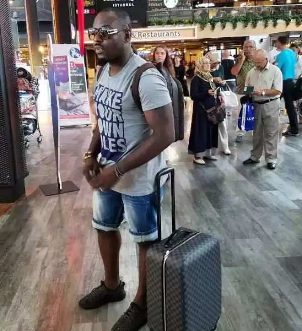 Jim Iyke Pictured At The Airport, Looking Casually Stylish
